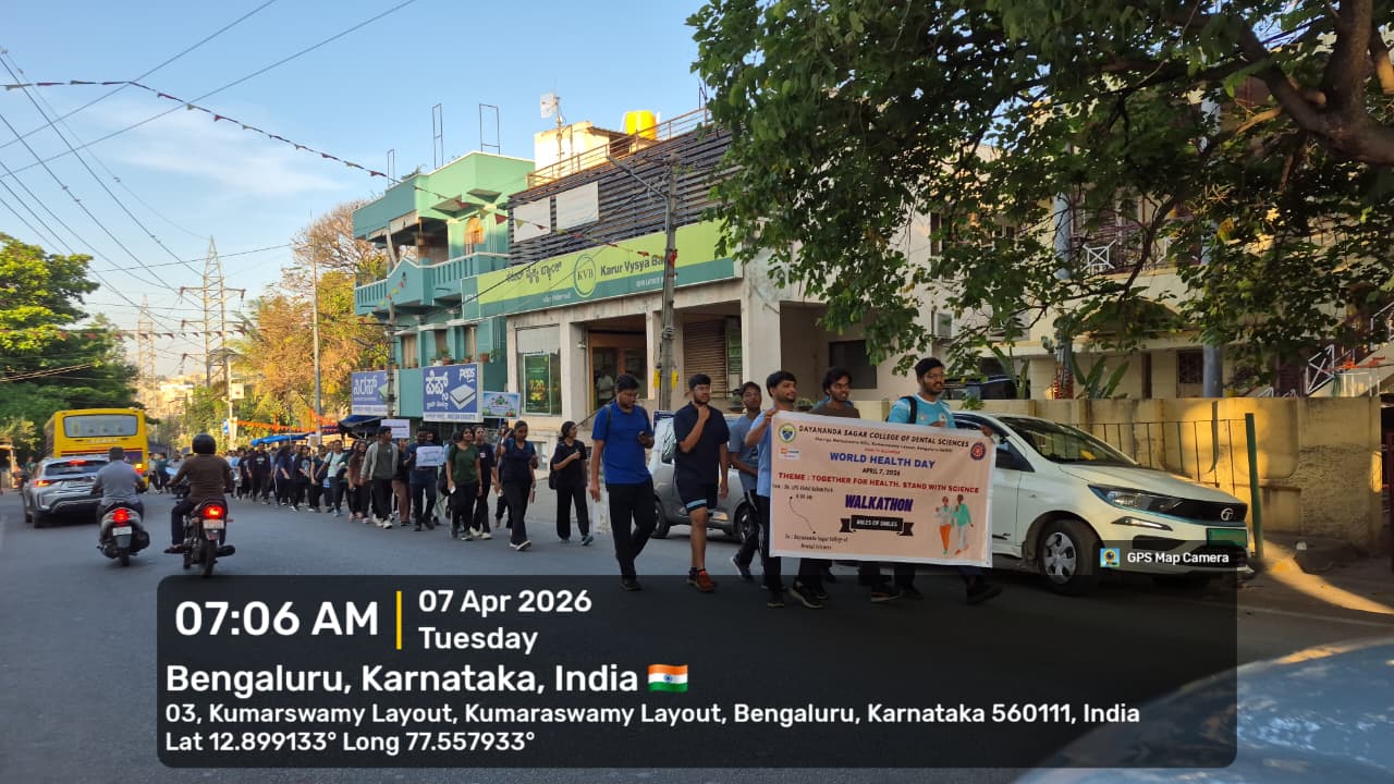 Walkathon participants passing by a gas station during the event.