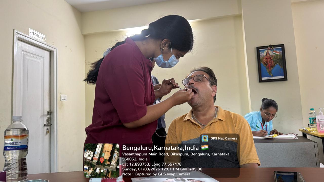 Dental professional providing care to an elderly female patient