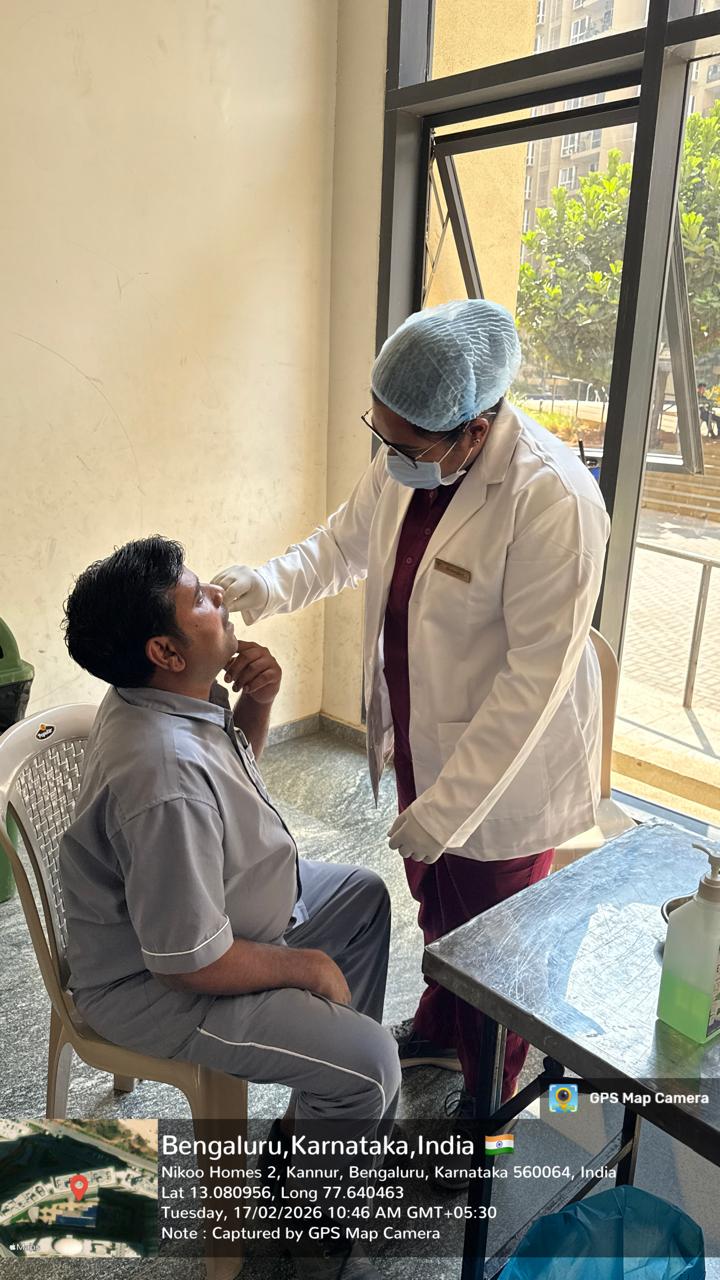 Dental professional performing an oral check-up