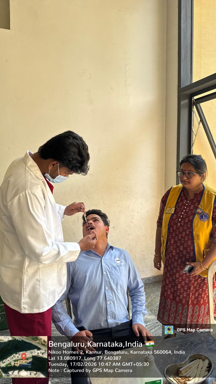 Female dental professional examining a patient
