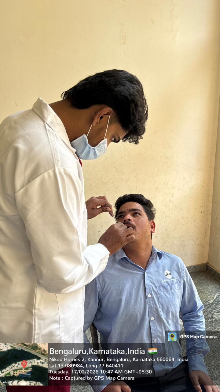 Dental professional screening an elderly patient