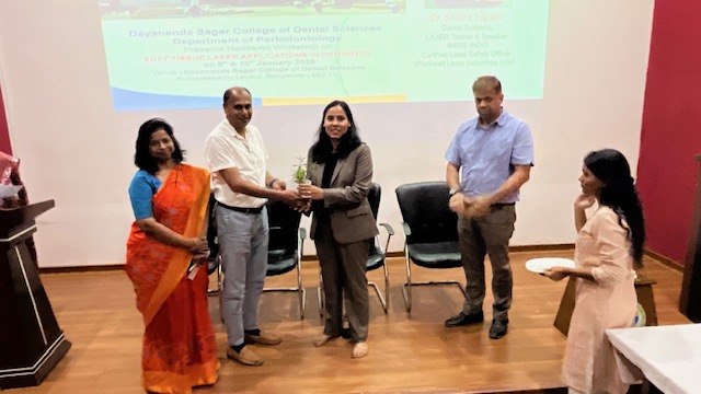 Memento being presented to the guest speaker Dr Shikha Tripathi