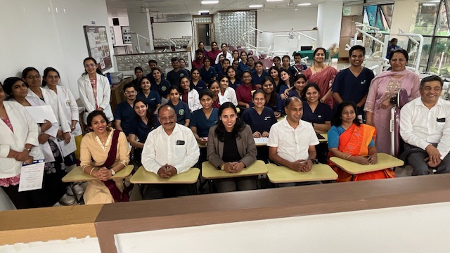 Group photo of participants and faculty at the laser workshop