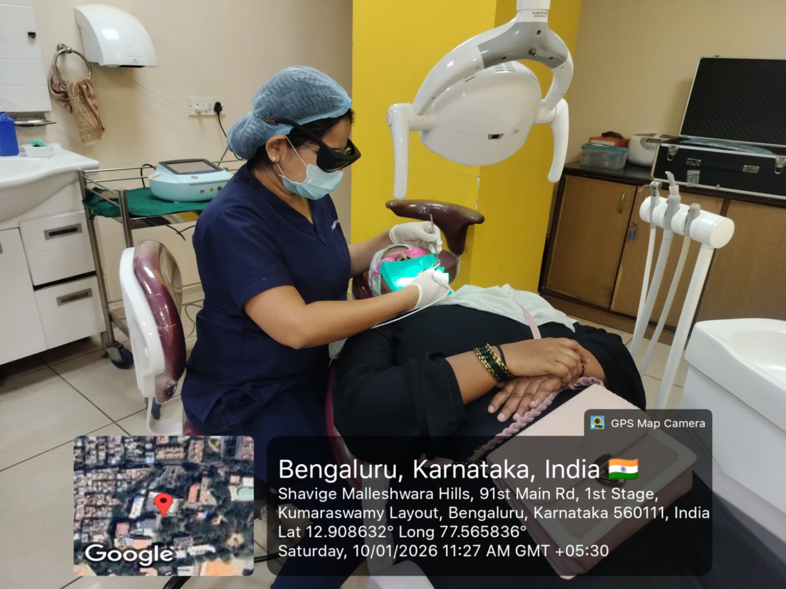 Postgraduate students performing live laser cases under supervision