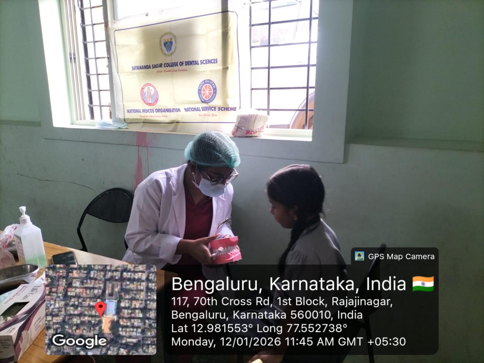 Dentist performing an oral examination on a young patient