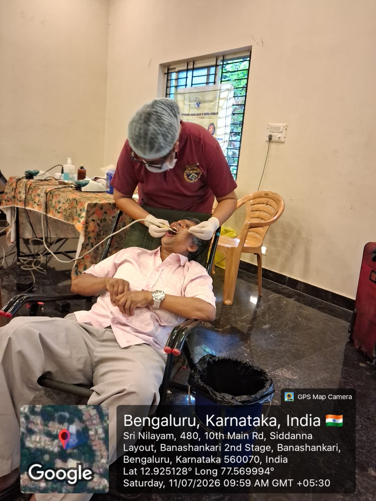 Dentist performing a dental scaling procedure on a patient