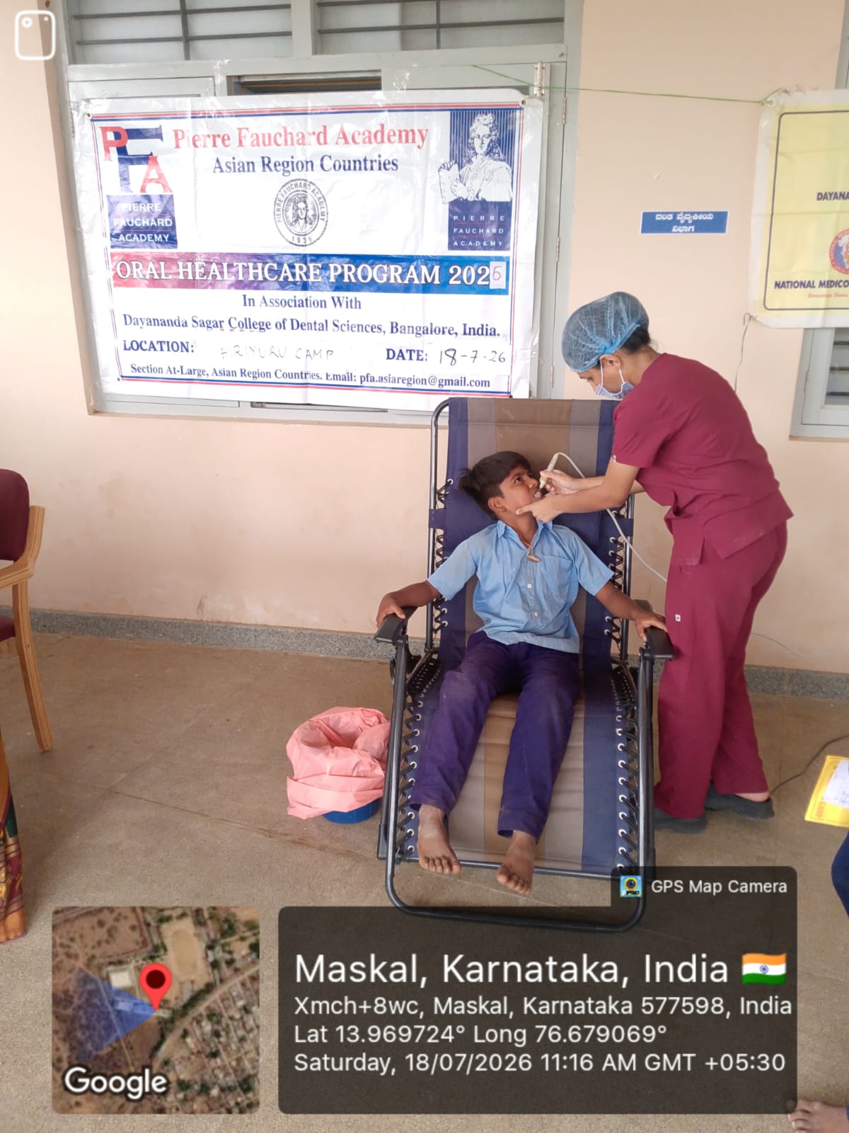 Female dentist performing a dental check-up on a child