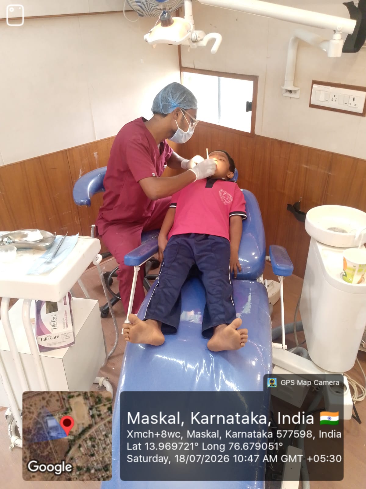 Dental professionals educating patients with dental models