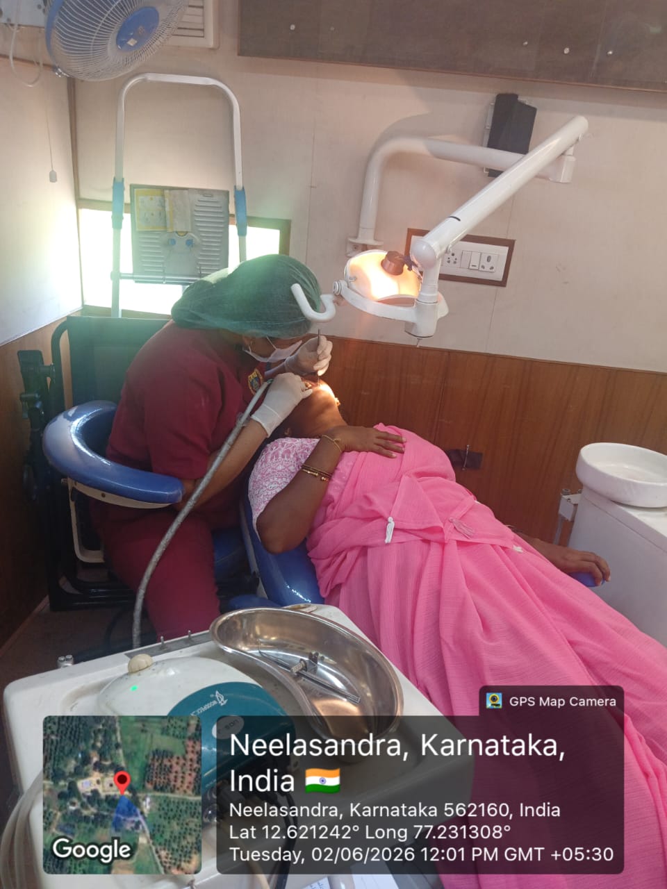 Dental professional performing an extraction