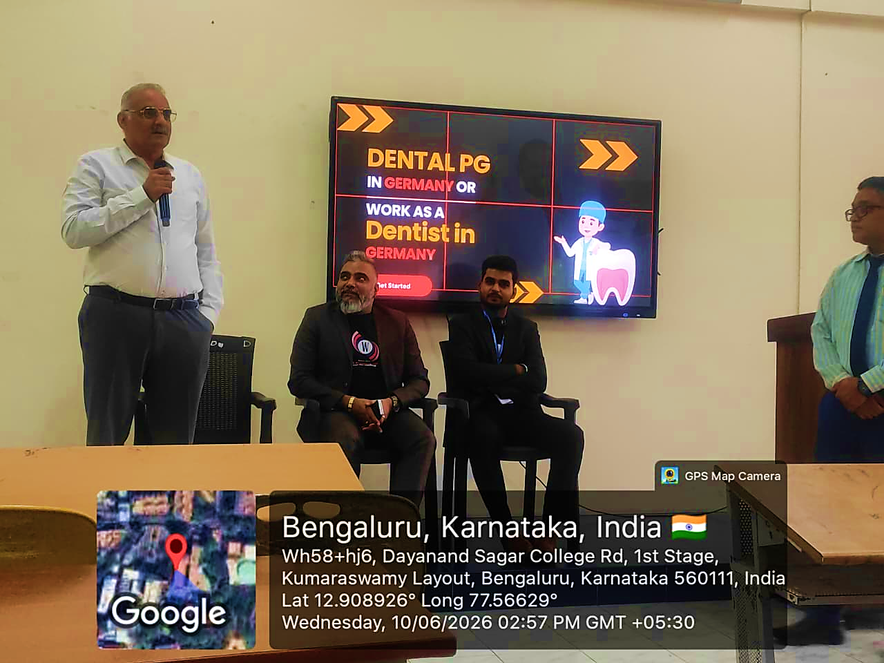 Dr. Hemanth M, Principal, DSCDS, speaking while Dr. Naresh Bhati and Mr. Vikas Singh are seated