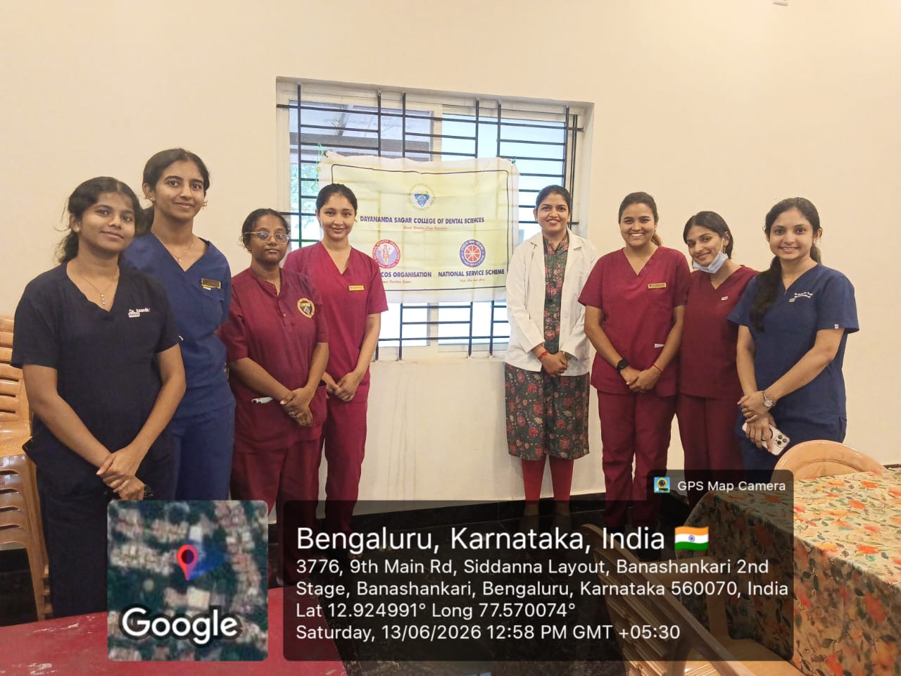 Group photo of the dental team and organizers at the camp