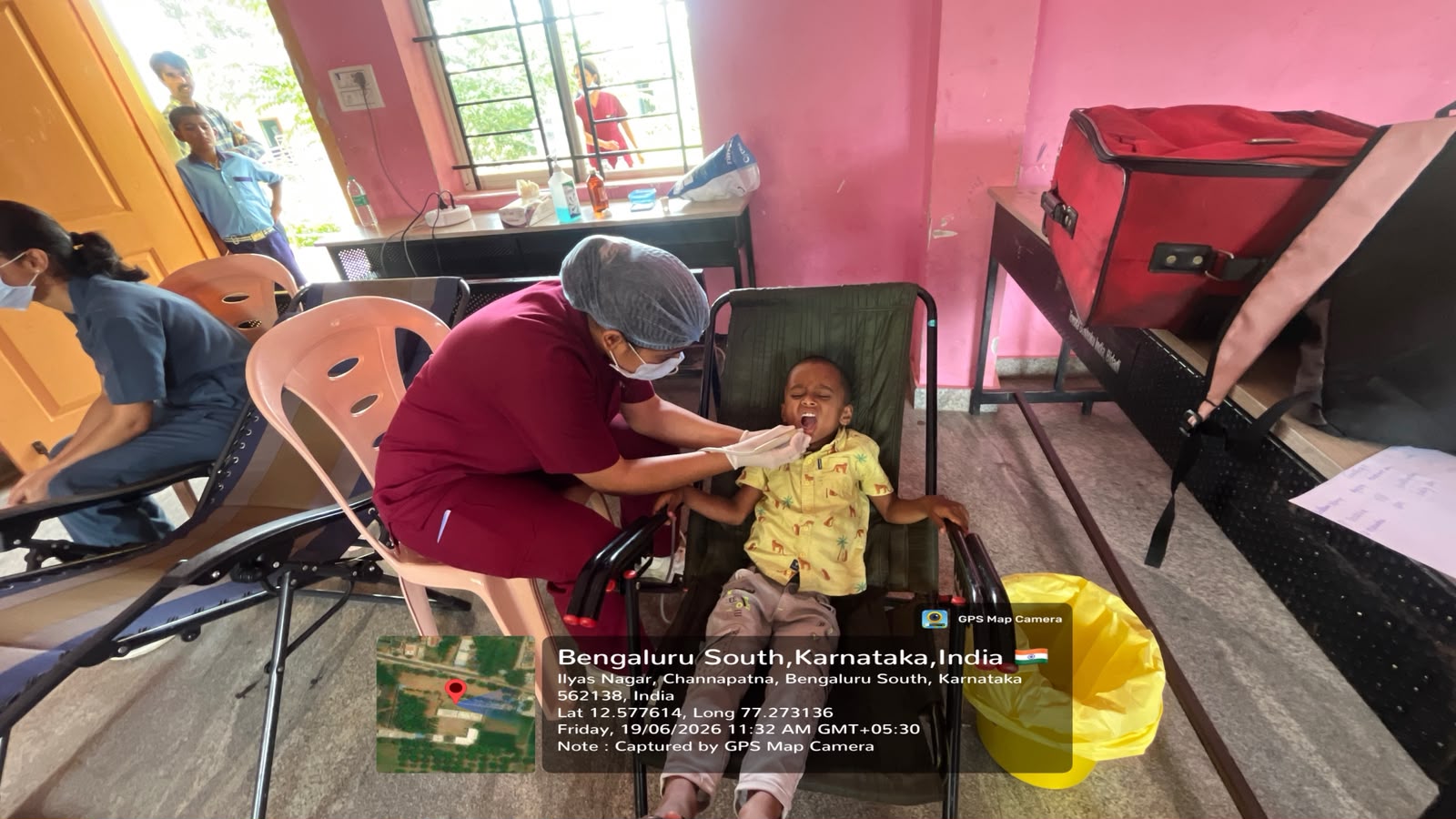 Child undergoing dental treatment in a mobile dental unit
