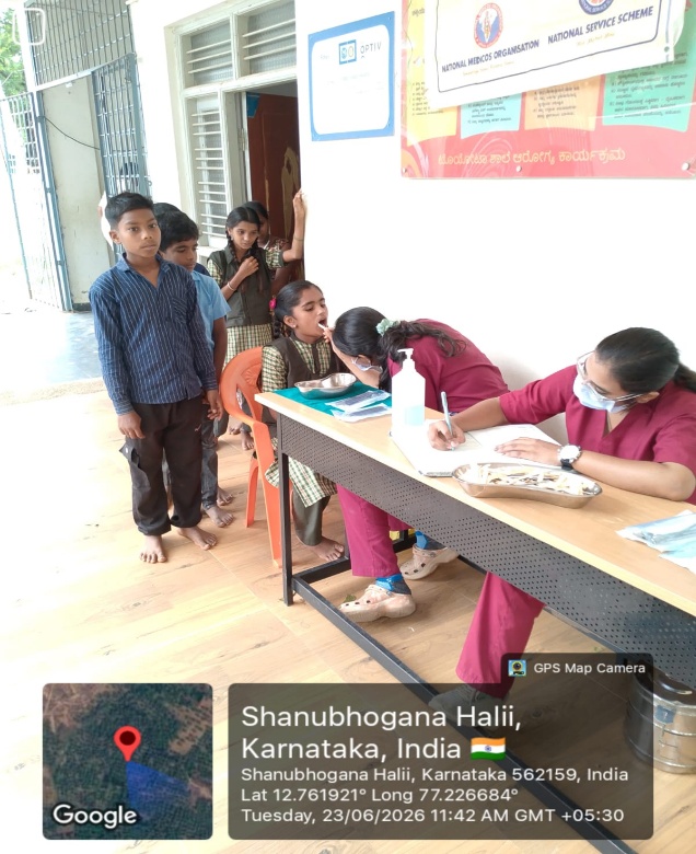 Students waiting for dental screening and a patient undergoing examination
